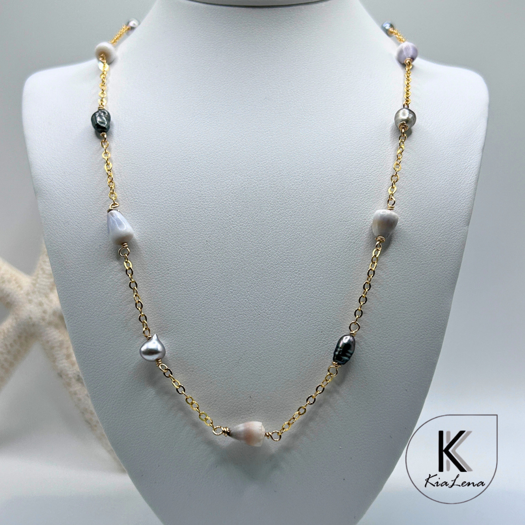 17 1/2" to 18 1/4"  Tahitian Keshi and Hawaiian Dwarf Cone Shell Necklace