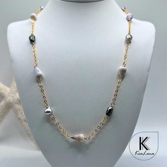 17 1/2" to 18 1/4"  Tahitian Keshi and Hawaiian Dwarf Cone Shell Necklace
